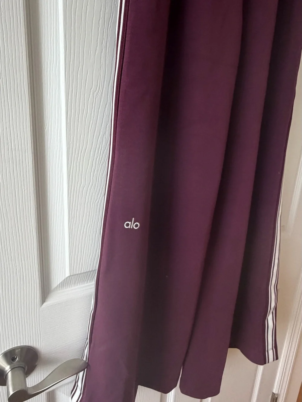 ALO Yoga Wide-Leg Track Pants in Plum with White Side Stripes - Picture 4 of 10